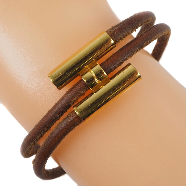 HERMES】エルメス トゥルニス レザー×金メッキ 茶 レディース