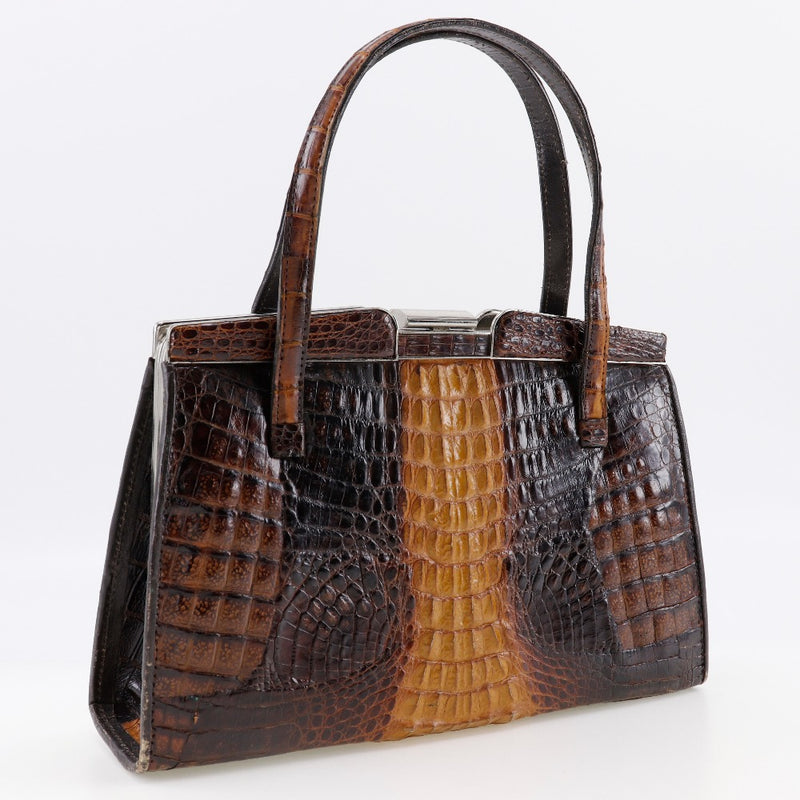 Back crocodile handbag 
 Crocodile Brown Tall Crocodile Ladies