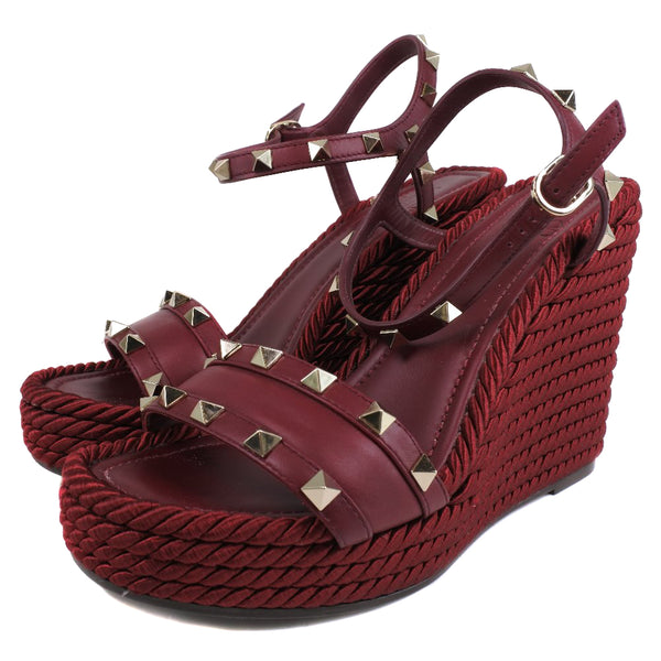 [Valentino Garavani] Valentino Garavani 
 Sandales de semelle de coin 
 Étalons sw2s0k08 veau rouge wedge sole dames un rang