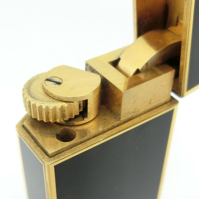 [Cartier] Cartier 
 Escritor de gases 
 Laca negra pentagonal x gaseado de oro encendedor para hombres
