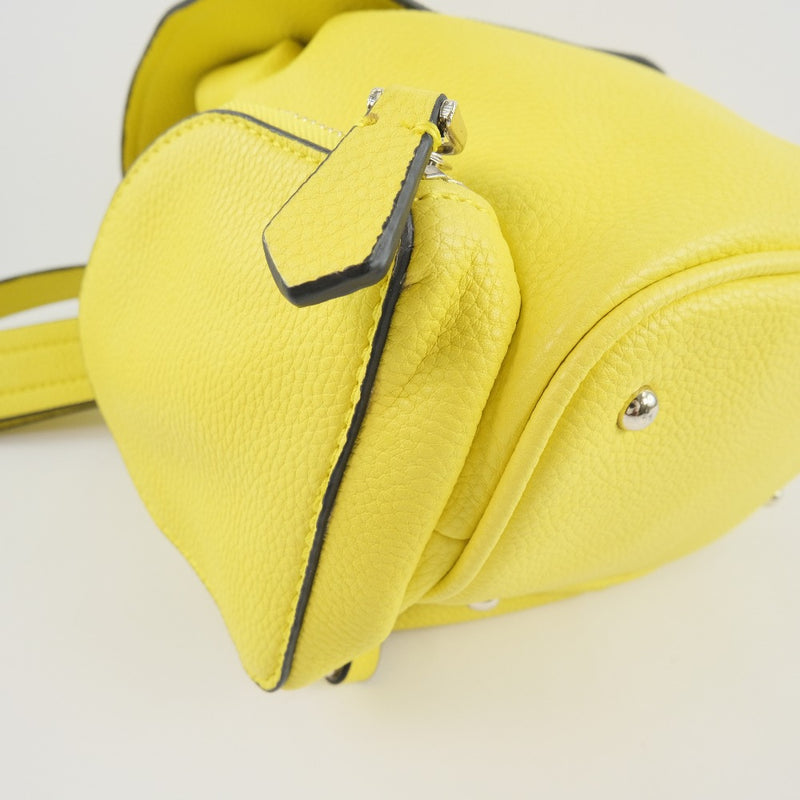 [Supongo] Adivina 
 Mochila de Luc 
 Cuero amarillo unisex un rango