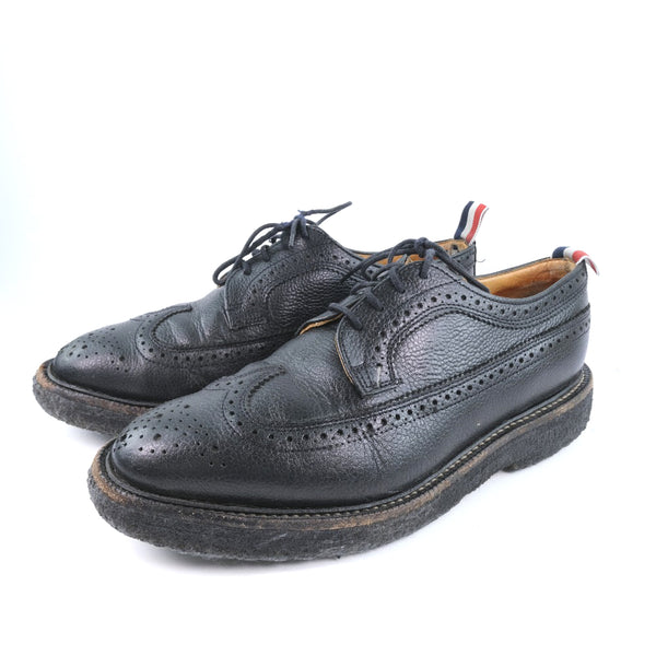 [Thom Brown] Tom Brown 
 Zapatos de negocios y otros zapatos 
 Zapatos de negocios negros de cuero