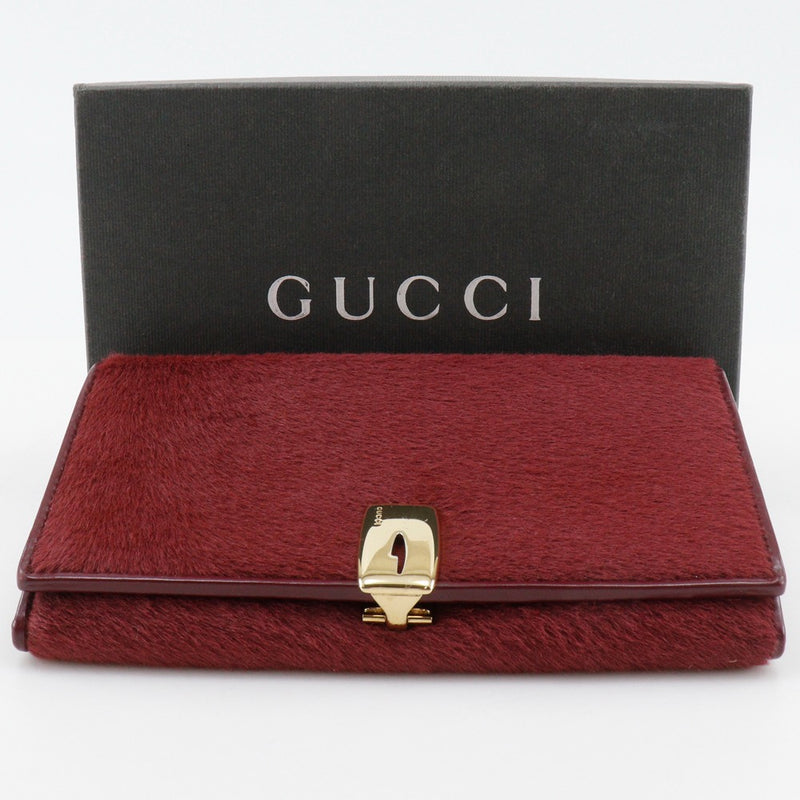 [GUCCI] Cartera larga con bolso Gucci 
 035.0416.1906.0
