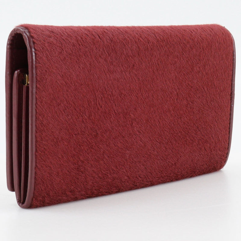 [GUCCI] Cartera larga con bolso Gucci 
 035.0416.1906.0