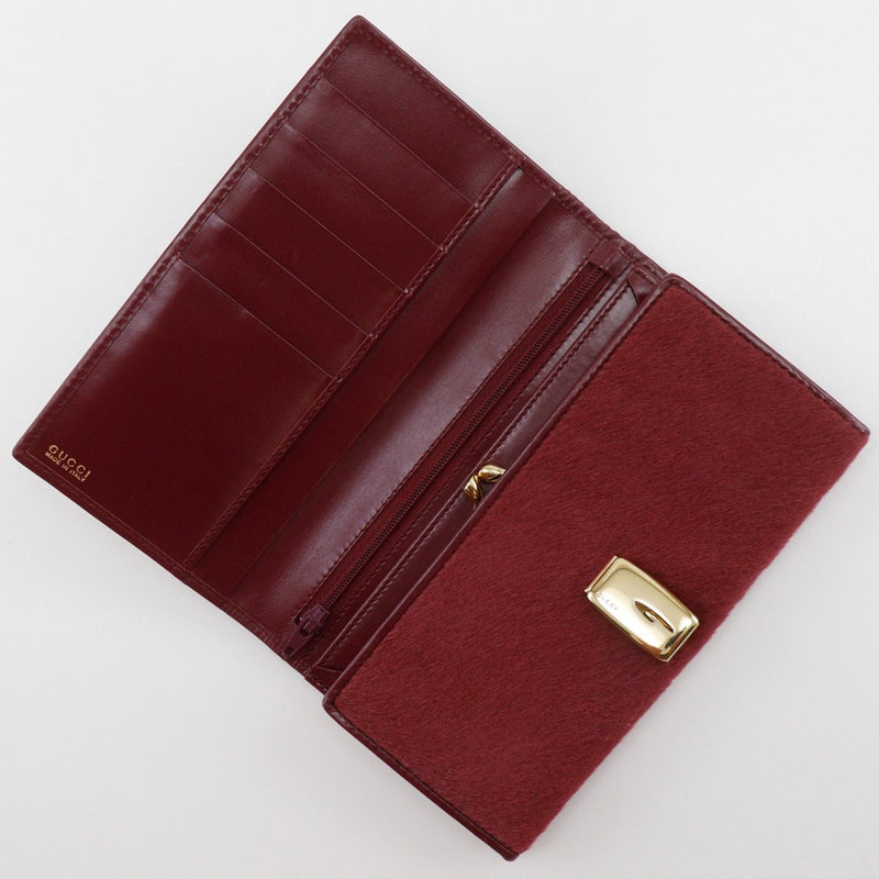 [GUCCI] Cartera larga con bolso Gucci 
 035.0416.1906.0
