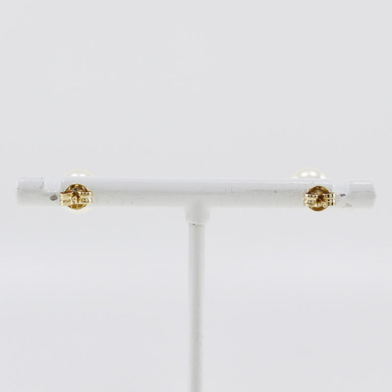 Perforación 
7.7 mm K18 oro amarillo x perla aproximadamente 1.7 g de damas un rango