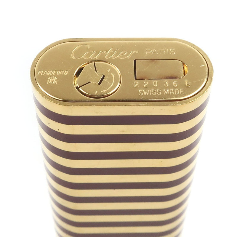 [Cartier] Cartier 
 Escritor de escritor de gasolina 
 Tipo ovalado Gold X Burdeos Roller Gas Lighter_