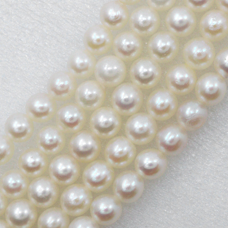 collier de perles pour bébé