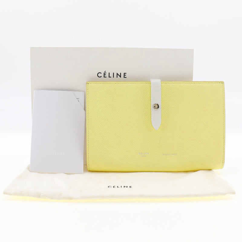 [Celine] Celine 
 Strap large wallet 
 Multi -function 104873 Leather Yellow Snap button Strap Large Ladies