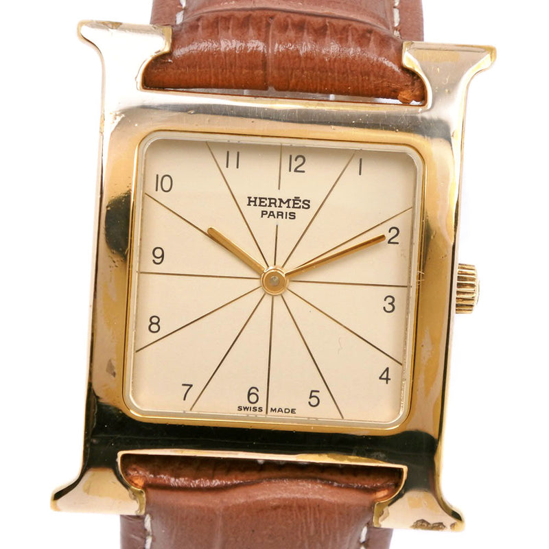 【HERMES】エルメス
 Ｈウォッチ 腕時計
 ラムサス RS1.501 ステンレススチール×金メッキ×レザー 茶 クオーツ アナログ表示 ゴールド文字盤 H watch メンズ