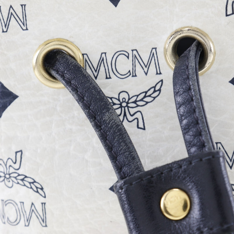 [MCM] MC M 
 버킷 숄더 숄더백 
 PVC 대각선 드리핑 버킷 어깨 숙녀
