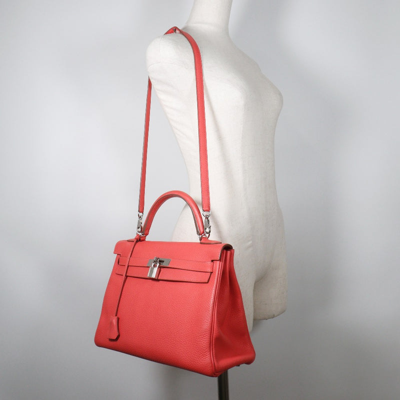 [HERMES] Hermes 
 Kelly 32 Handbag 
 Inner sewn tryon lemance Coral pink □ R stamped shoulder handbag 2WAY A5 belt bracket Kelly 32 Ladies A-Rank