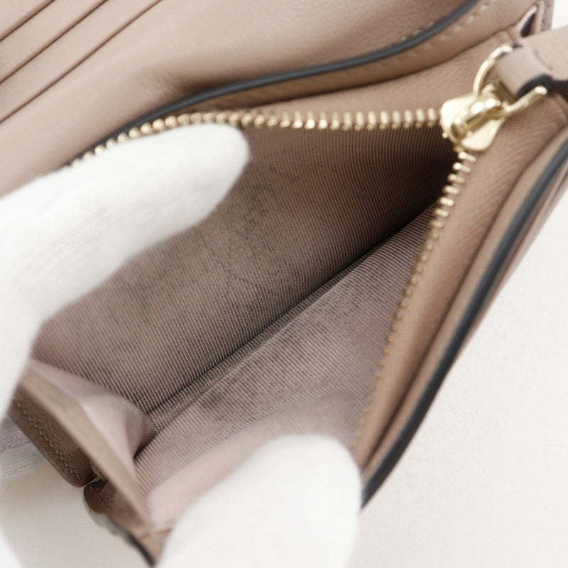 [VALENTINO GARAVANI] Valentino Garavani Rock Studs Small Wallet Bi-Fold Wallet
 WW2P0P39BOL