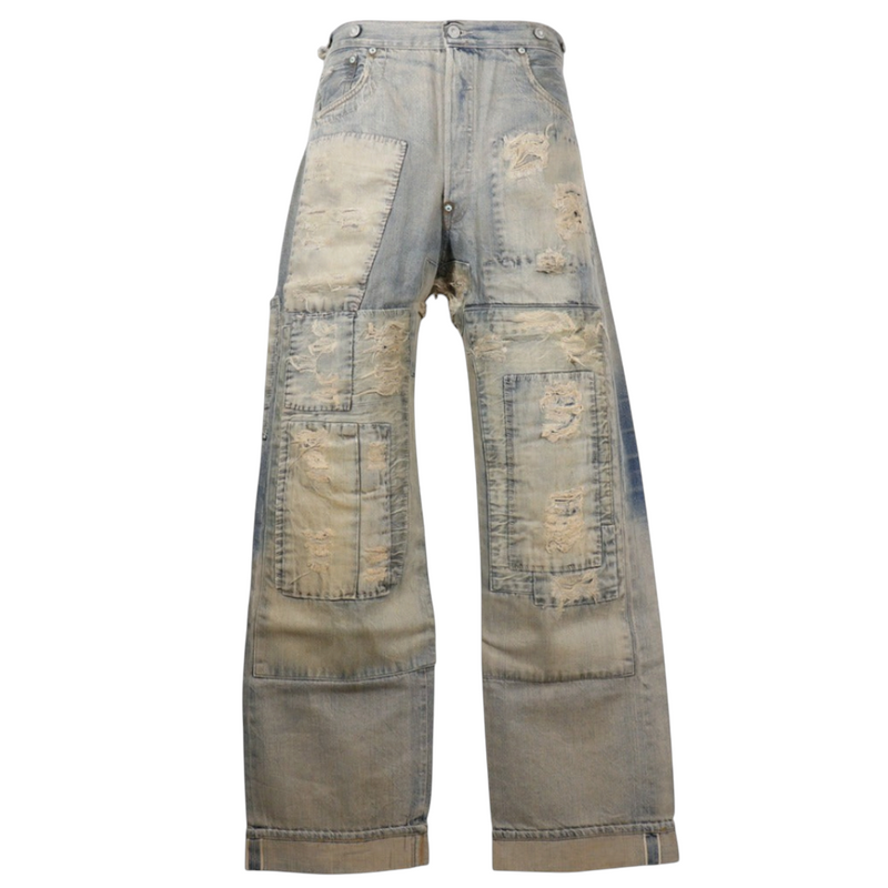 NISHIKINO VINTAGE KYOTOのリーバイス セレブレーション限定デニムパンツ。ヴィンテージ加工が施された青いコットン素材のパッチワークジーンズ。