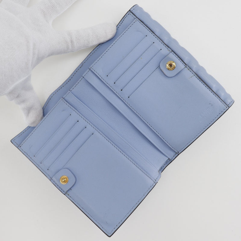 [FENDI] Fendi 
 Medium baguette Bi-Fold Wallet
 FF Emboss 8m0419 Calfskin Light blue snap button Medium Baguette Ladies