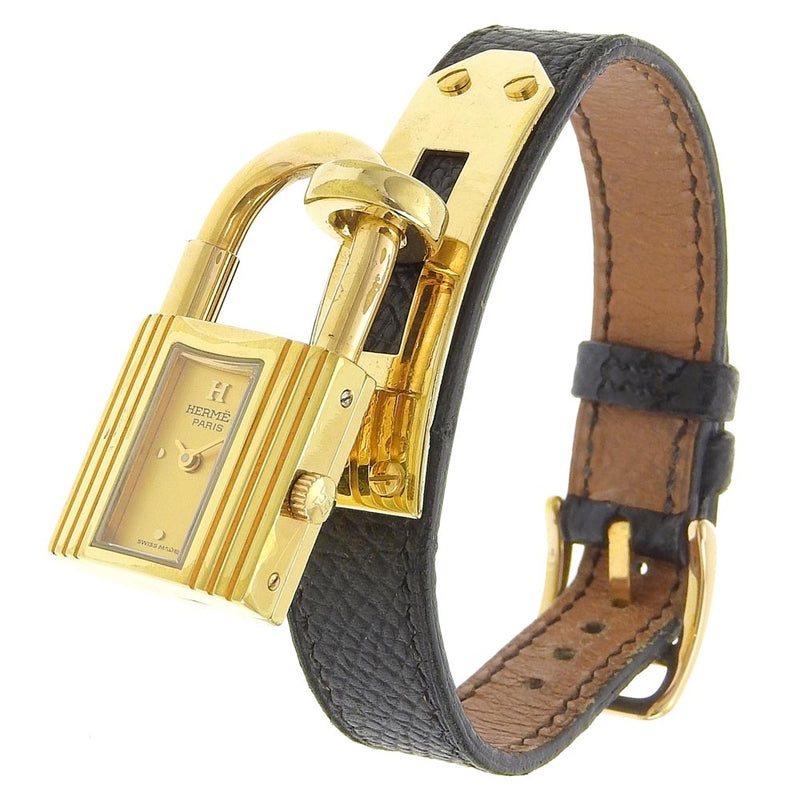 [HERMES] Hermes 
 Kelly Watch Watch 
 Gold plating x leather black □ A engraved quartz analog display Gold dial Kelly Watch Ladies