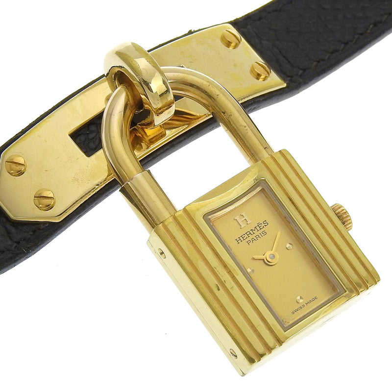 [HERMES] Hermes 
 Kelly Watch Watch 
 Gold plating x leather black □ A engraved quartz analog display Gold dial Kelly Watch Ladies