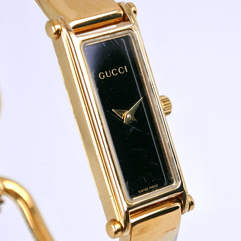 【GUCCI】グッチ
 1500L 金メッキ ゴールド クオーツ アナログ表示 レディース 黒文字盤 腕時計