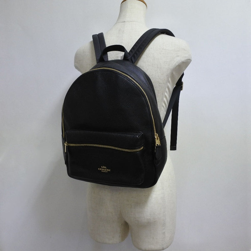 coach f30550 medium charlie backpack black in Grey Pebble Leather sleek shapes and fine fabrics in mind Coach Backpacks Leather Backpack F30550