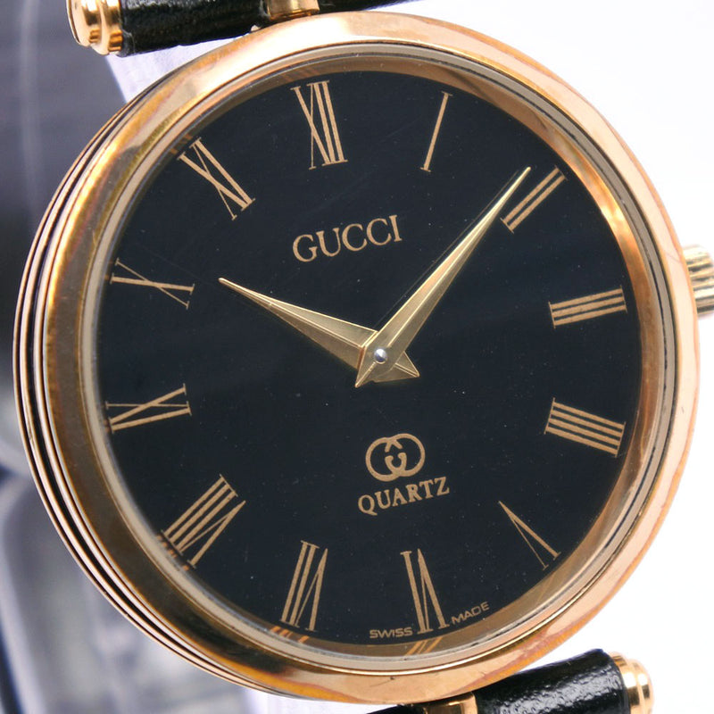 [Gucci] Gucci Reloj de acero inoxidable x Reloj de dial negro de cuarzo de oro de cuero de cuero