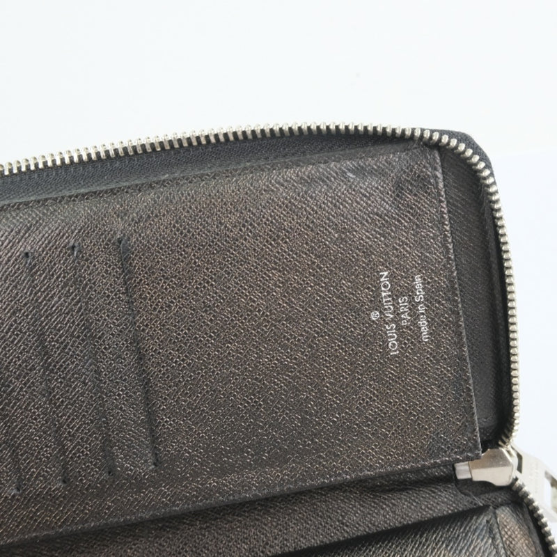 Louis Vuitton Zippy Wallet Vertical In Gris