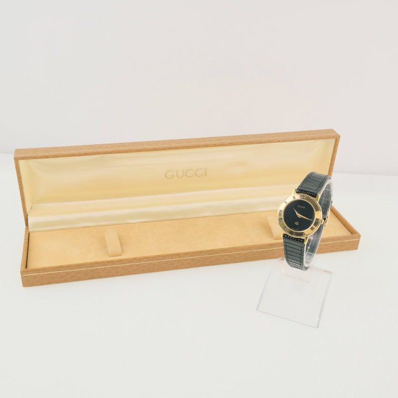 【GUCCI】グッチ
 3000L 腕時計
 ステンレススチール×レザー ゴールド クオーツ アナログ表示 レディース 黒文字盤 腕時計
