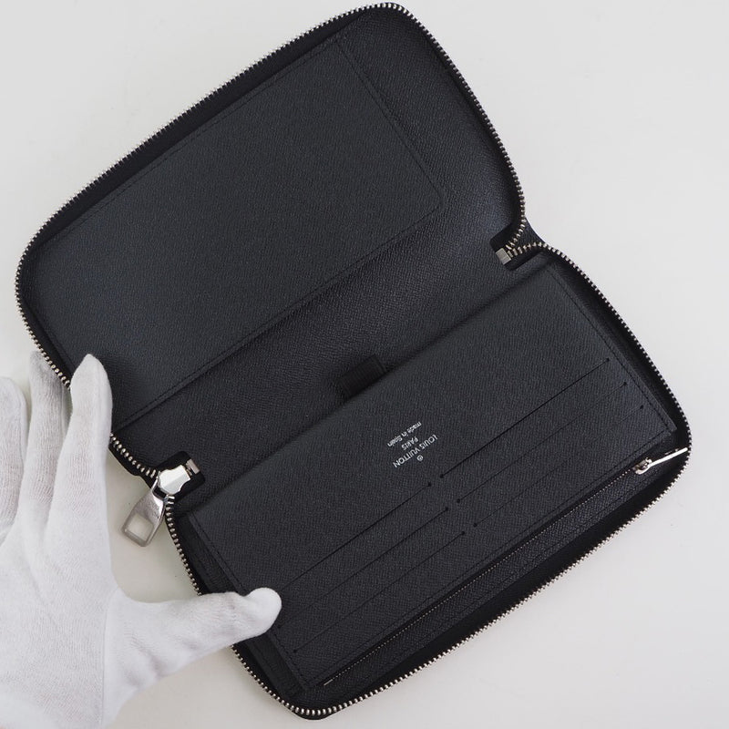 Louis Vuitton Organizer wallet in black patent epi leather