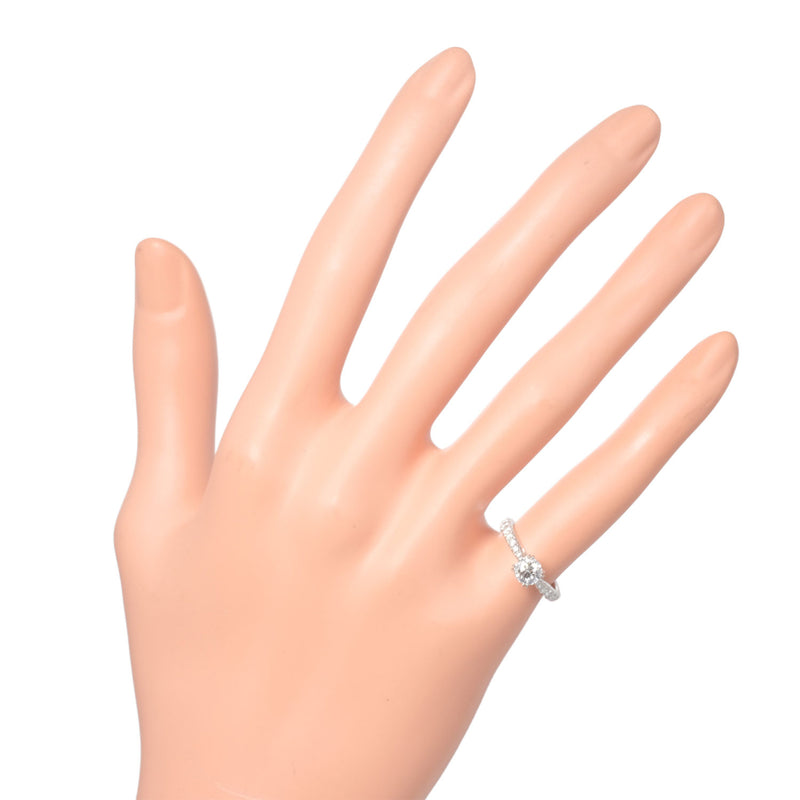 Harry Winston three stone emerald-cut engagement ring.